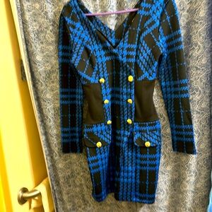 Blue dress with gold eagle buttons.